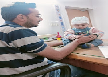 Dr-vivek-bhatt-Child-specialist-pediatrician-Rajkot-Gujarat-1