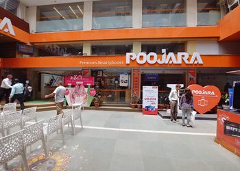 Poojara-telecom-pvt-ltd-Mobile-stores-Rajkot-Gujarat-1